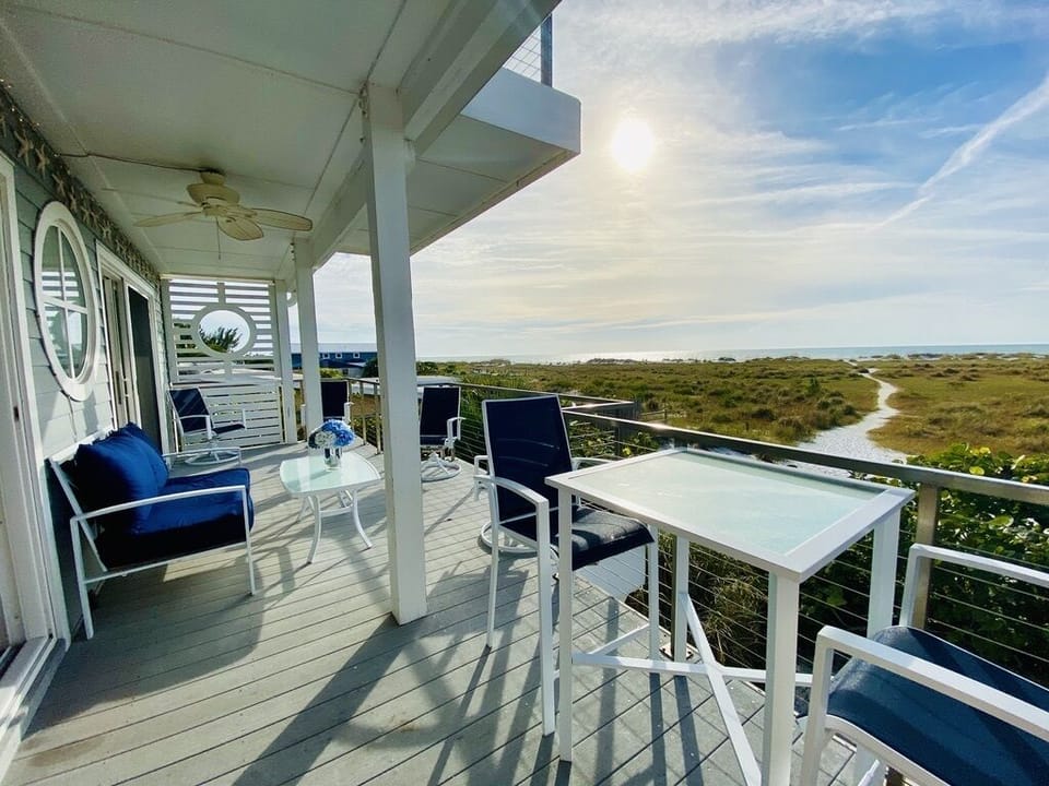 Patio with plenty of seating overlooking the Gulf of Mexico.