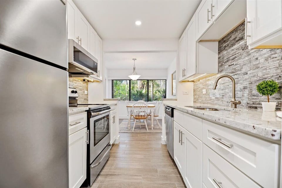 Kitchen - Fully Equipped w/ Stainless Steel Appliances + Counter Space