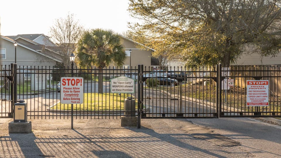 Secured entry gate with cameras