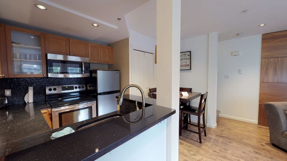 Fully equipped kitchen with modern appliances and all the essentials.