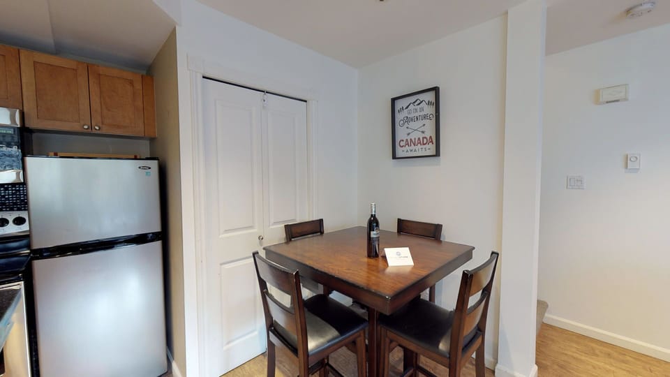 Gather around the dining table for meals, games, or planning the day's adventures.