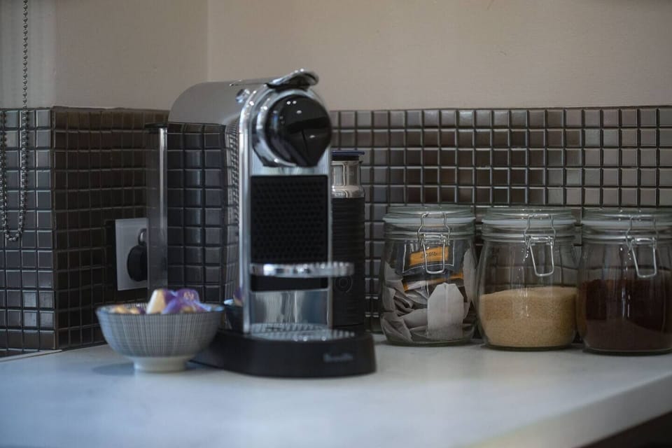 Nespresso Pod machine with welcome/starter pack of Pods provided.