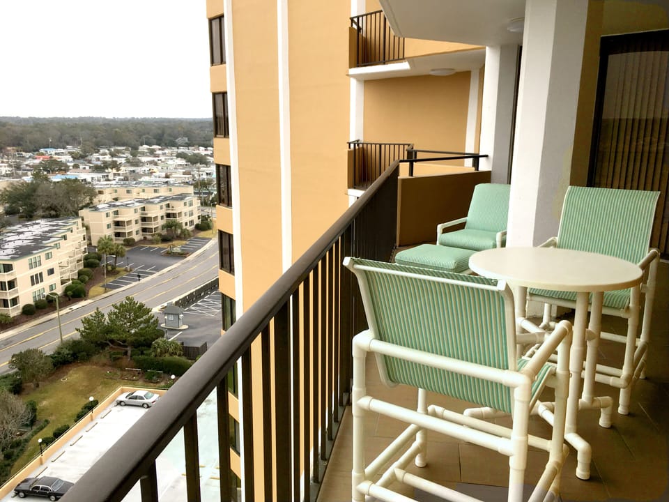 Private deck with tables and chairs