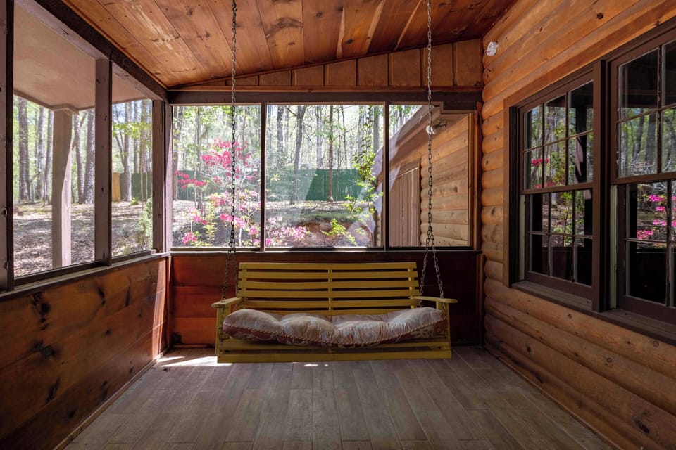 Front porch swing - Relax on the screened front porch and unwind on the porch swing while listening to the peaceful sounds of birds and the surrounding mountain woods.