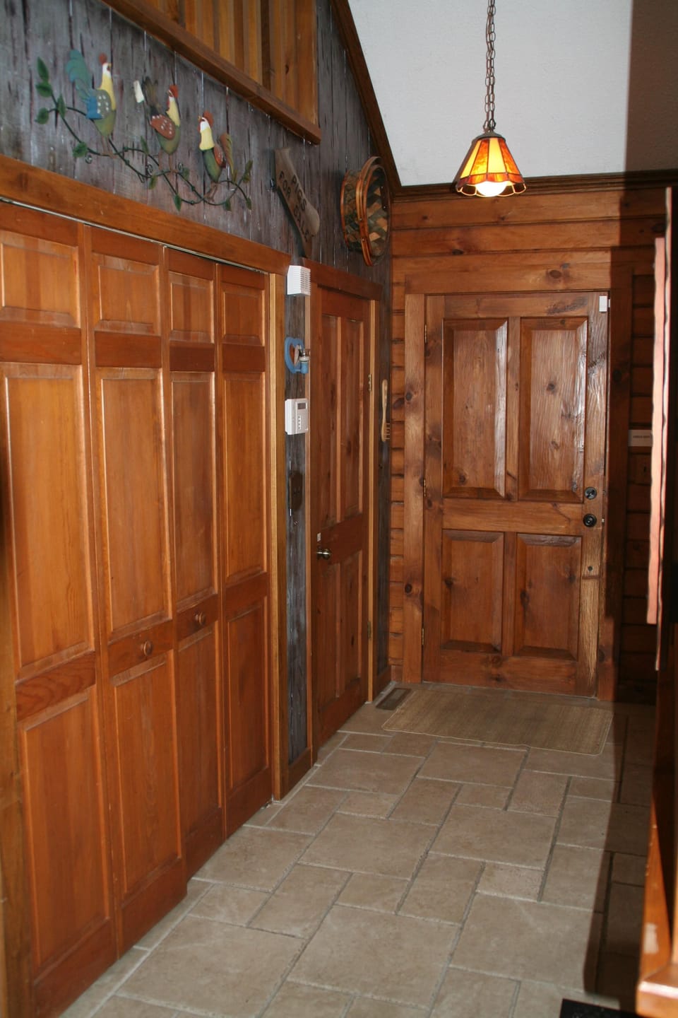 front door entrance next to kitchen