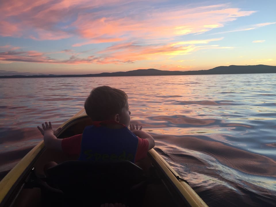 Kayaking during Sebago sunset