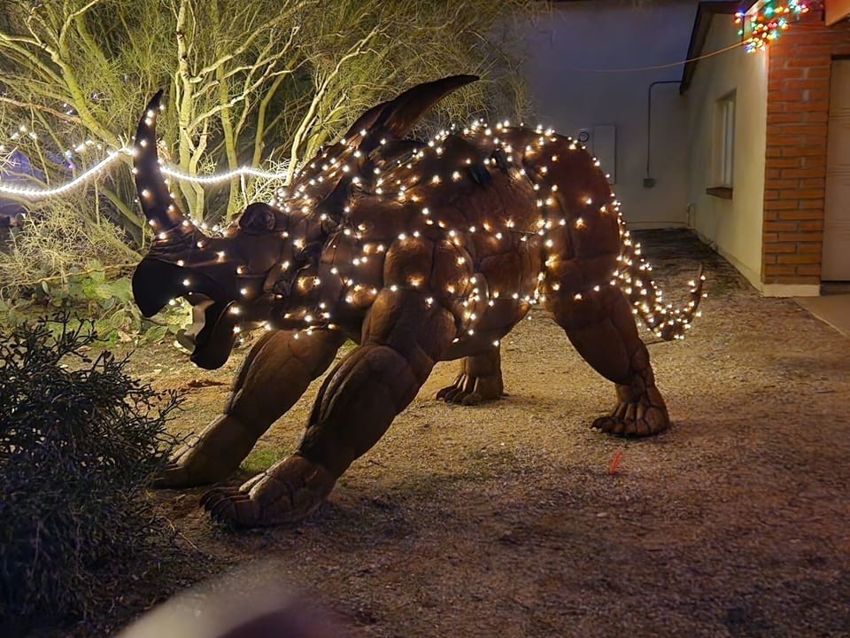 Styracosaurus at night guarding the front gate to the ranch--our2nd dinosaur.