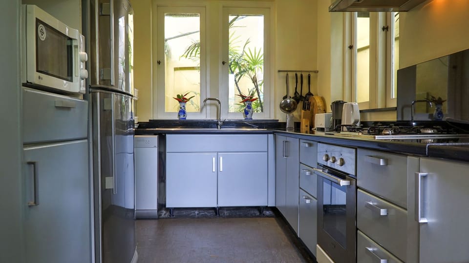 Kitchen has dishwasher, stand up fridge, freezer, microwave etc 