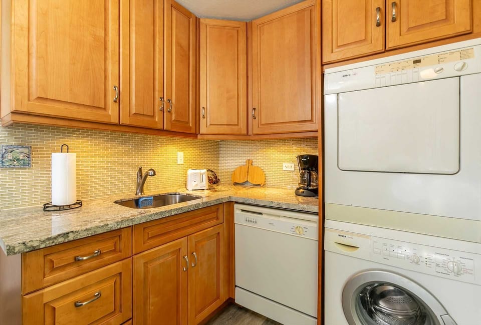 Full kitchen with private washer and dryer.