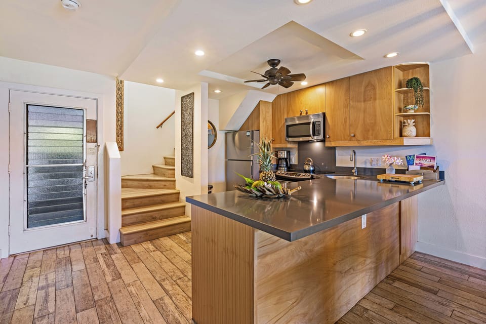 Kitchen - Fully equipped kitchen featuring modern stainless steel appliances and everything you need to prepare meals at home.