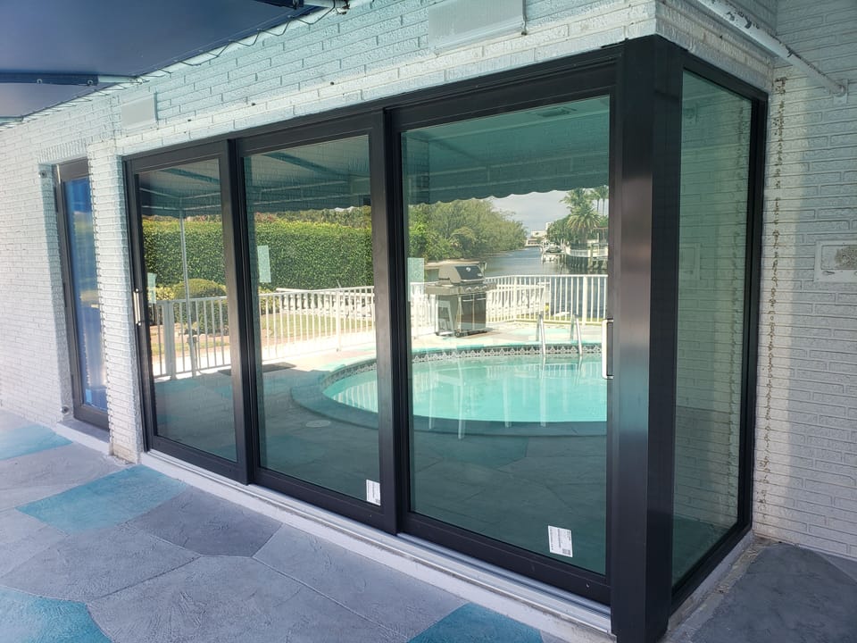 Panoramic breakfast area surrounded by hurricane energy efficient glass views