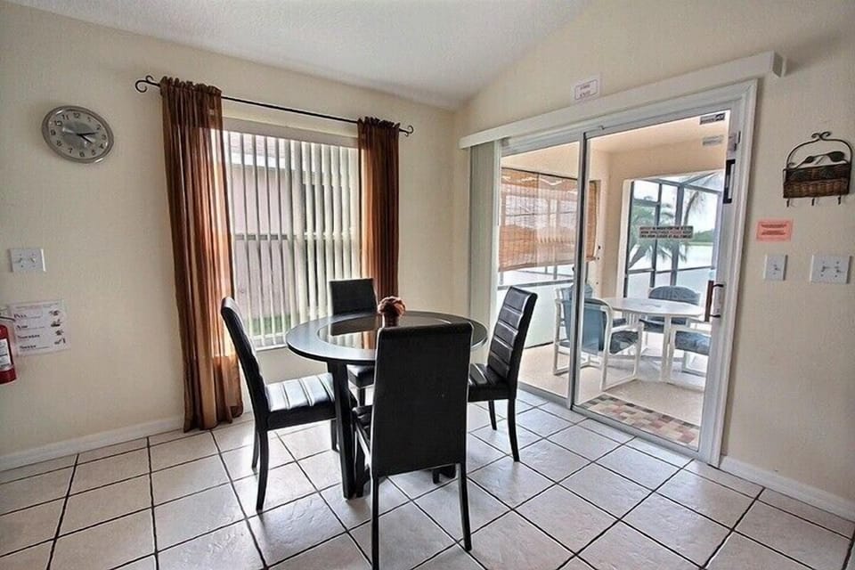 Breakfast nook leading out to pool area