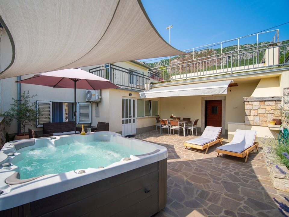 Water, Plant, Sky, Property, Swimming Pool, Chair, Azure, Shade, Outdoor Furniture, Architecture