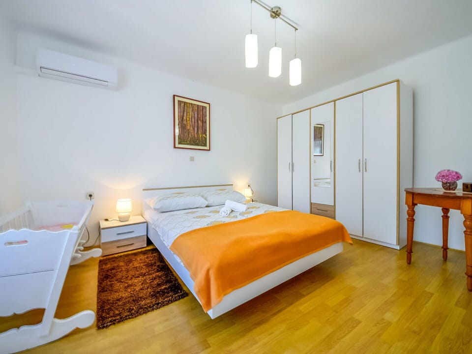Furniture, Building, Comfort, Door, Bed Frame, Wood, Orange, Lighting, House