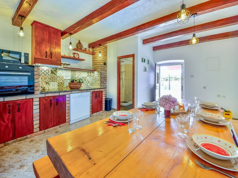 Furniture, Property, Table, Wood, Orange, Interior Design, Cabinetry, Floor, Flooring, Hardwood