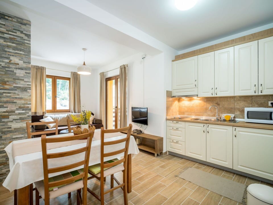 Furniture, Cabinetry, Property, Countertop, Kitchen Appliance, Wood, Houseplant, Table, Chair, Kitchen