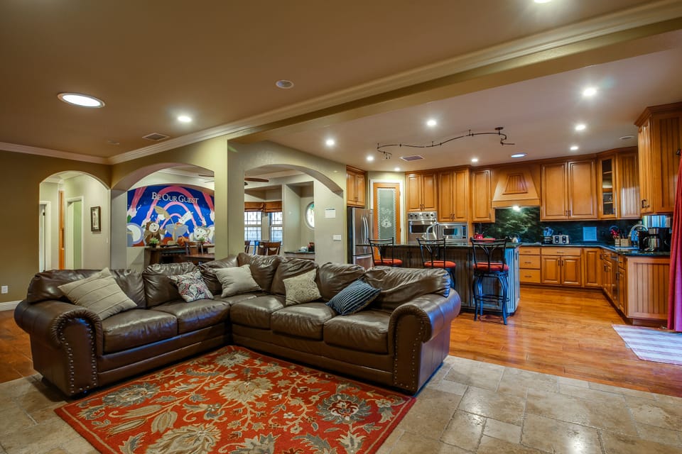 Spacious main living room is a great place for your family and friends to gather.