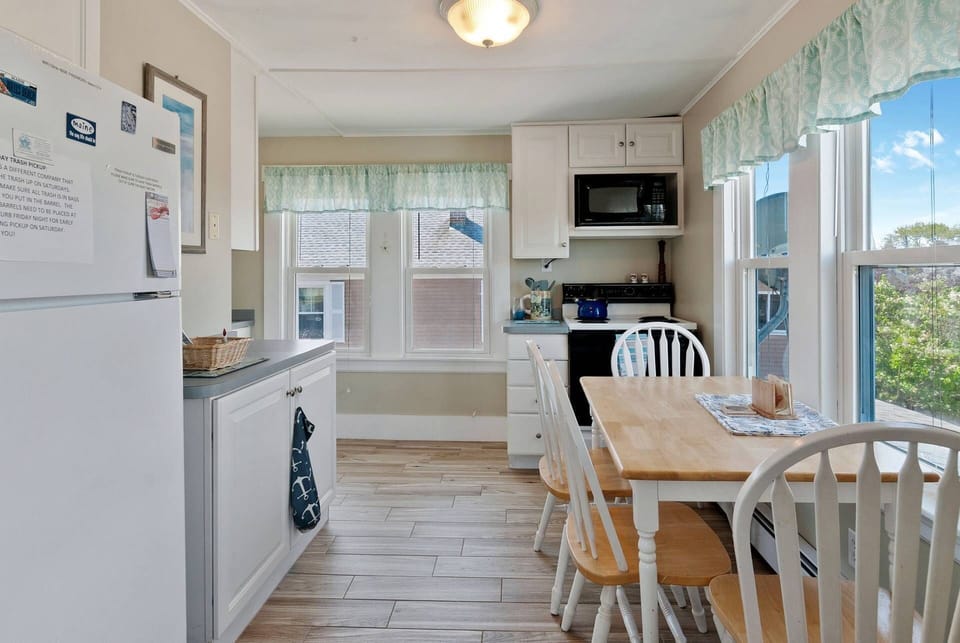 Newly tiled and full utensil stocked kitchen