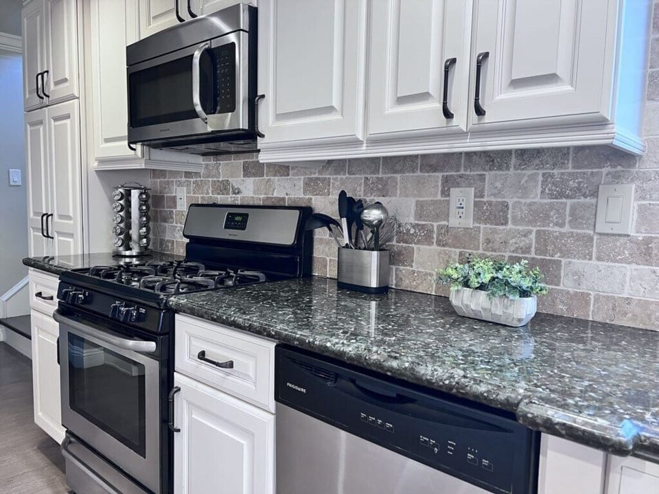 Spacious Custom Kitchen with Granite Countertops view 3
