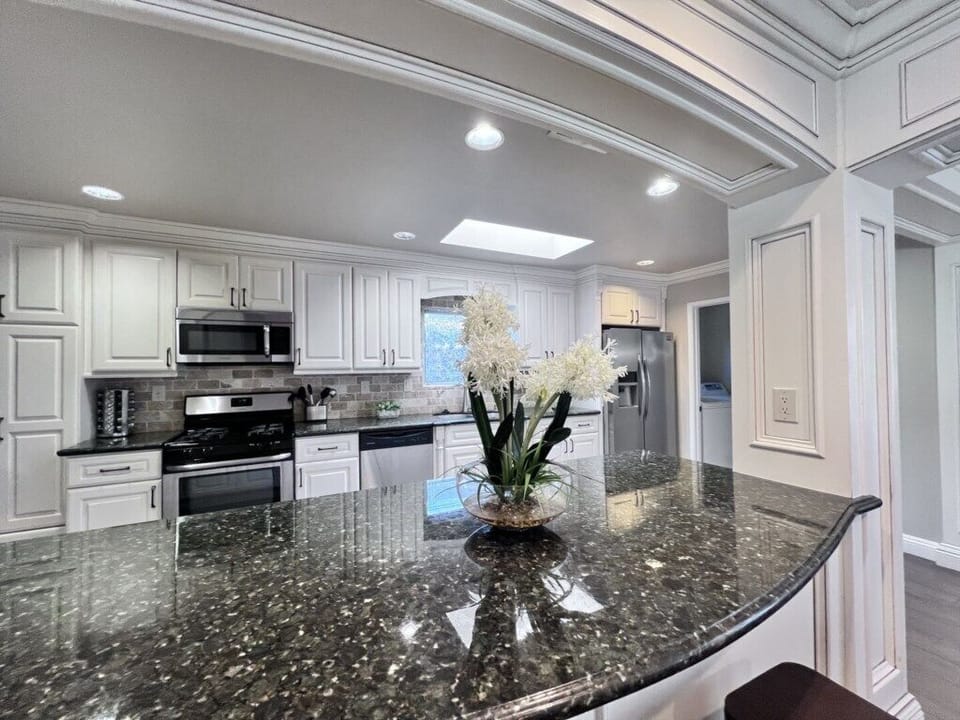 Spacious Custom Kitchen with Granite Countertops view 2