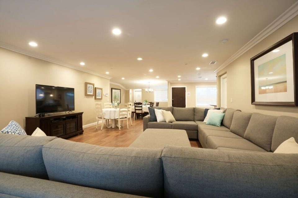 Spacious Open Concept Living and Dining Room
Oversized sectional with Queen-size pull-out sofa bed