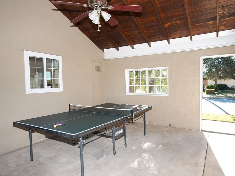 - Game room with full size ping pong table for fun   - Covered space perfect for family matches anytime   - Indoor entertainment designed for all ages to play