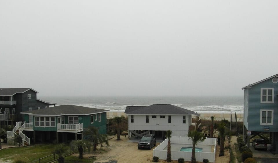 Front balcony ocean view. **Beach access directly across the street.