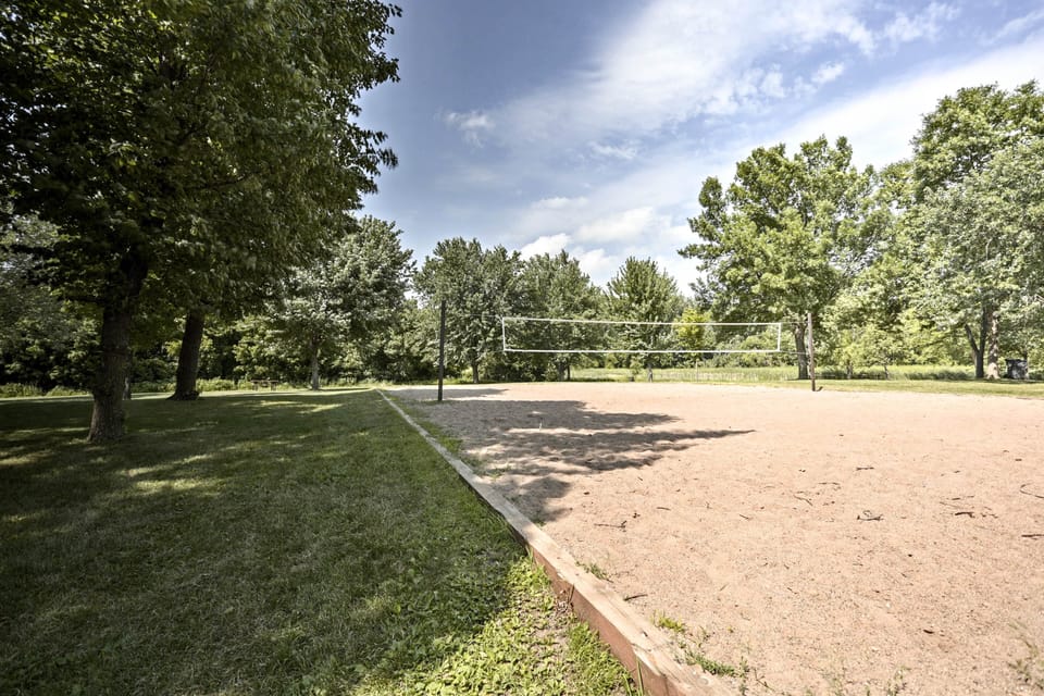 Play some sand volleyball with friends and family.