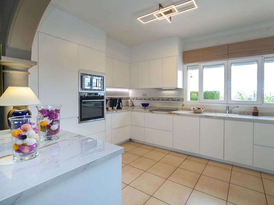 Kitchen, Kitchen Appliance, Countertop, Interior Design, Flooring, Cabinetry, Major Appliance, Ceiling, Furniture, Floor