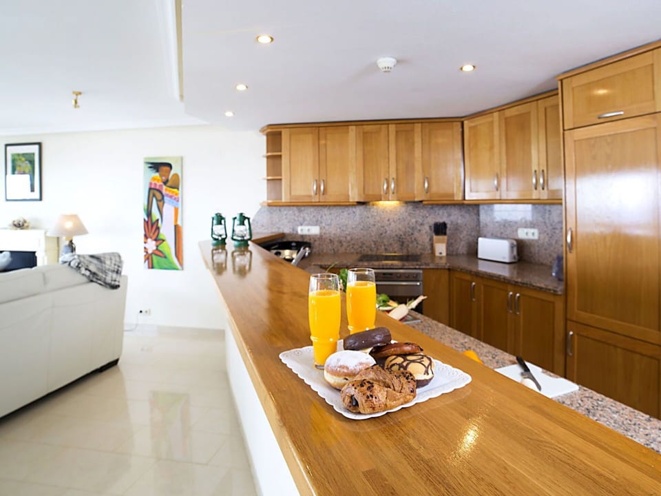 Countertop, Room, Kitchen, Property, Cabinetry, Furniture, Yellow, Interior Design, Floor, Building