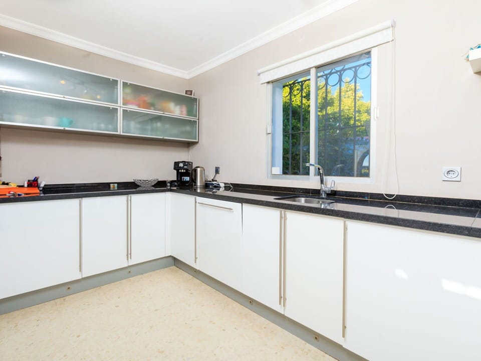 Property, Room, Kitchen, Real Estate, Yellow, Furniture, Building, Interior Design, House, Cabinetry