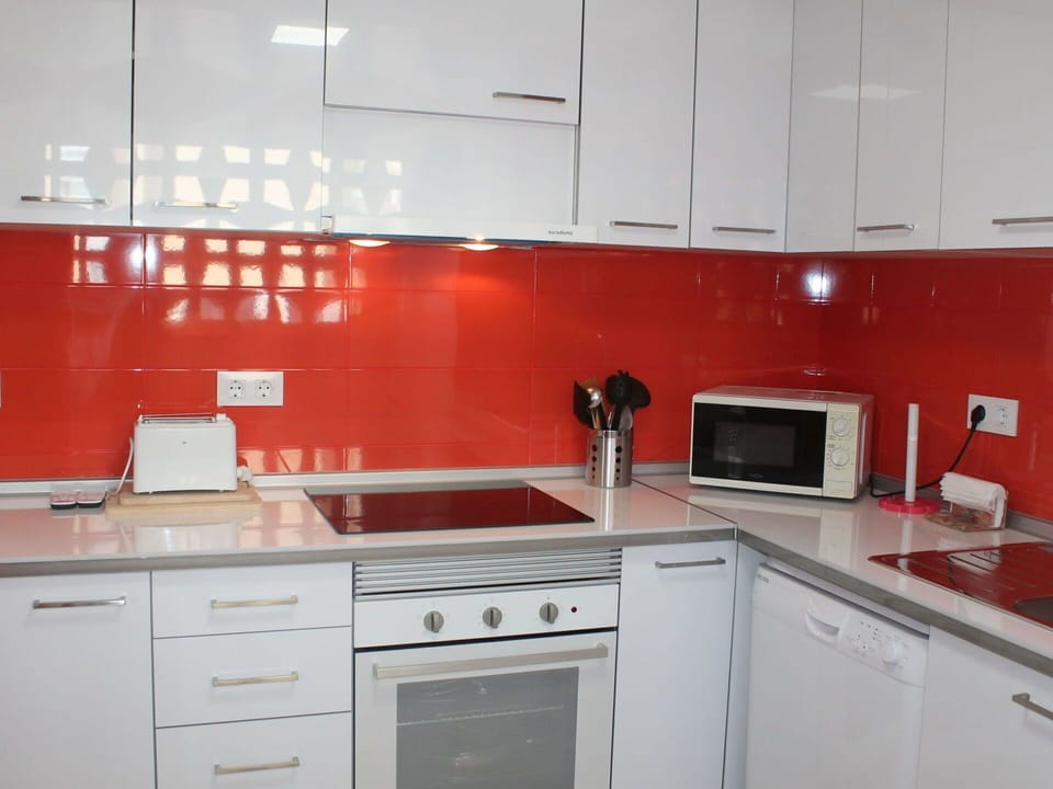Countertop, Kitchen, Room, Cabinetry, Property, Red, Furniture, Orange, Interior Design, Building
