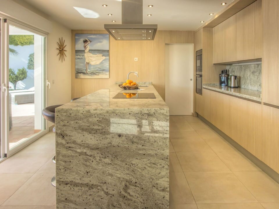 Property, Floor, Room, Tile, Interior Design, Countertop, Flooring, Yellow, Building, Wall