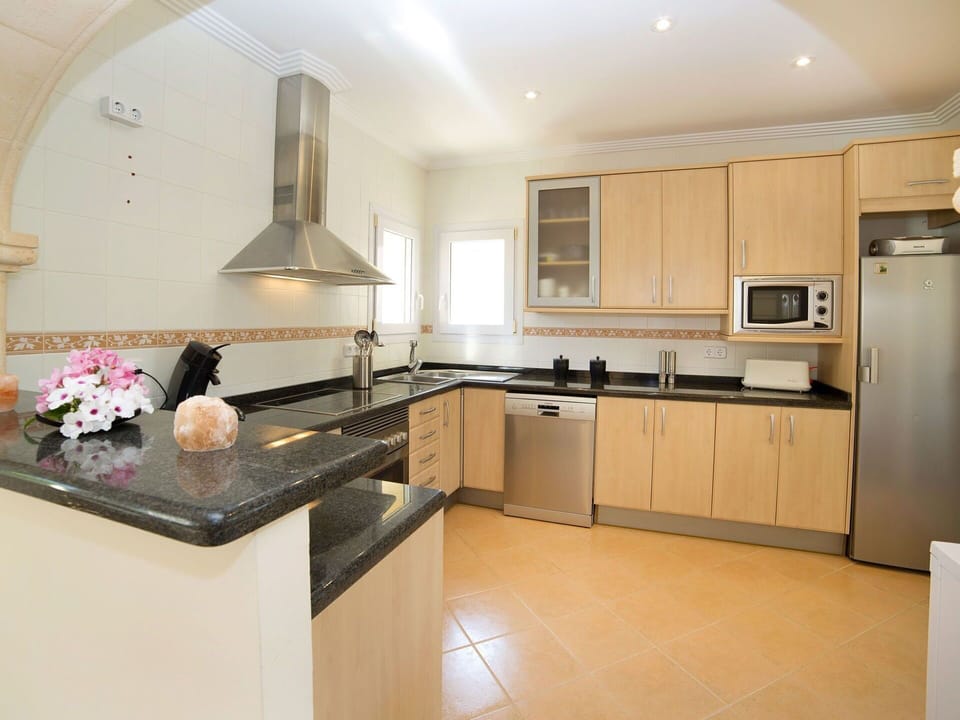 Countertop, Property, Room, Kitchen, Cabinetry, Furniture, Interior Design, Building, Floor, House