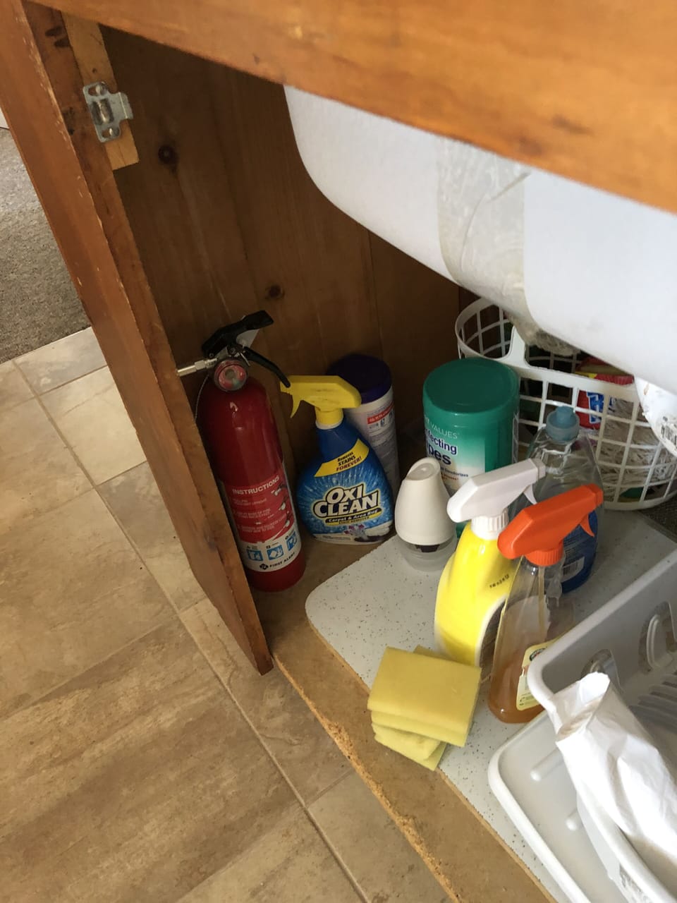 Fire extinguisher under kitchen sink
