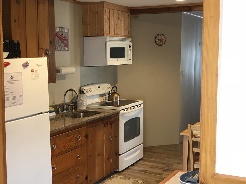 Updated kitchen with granite countertop 