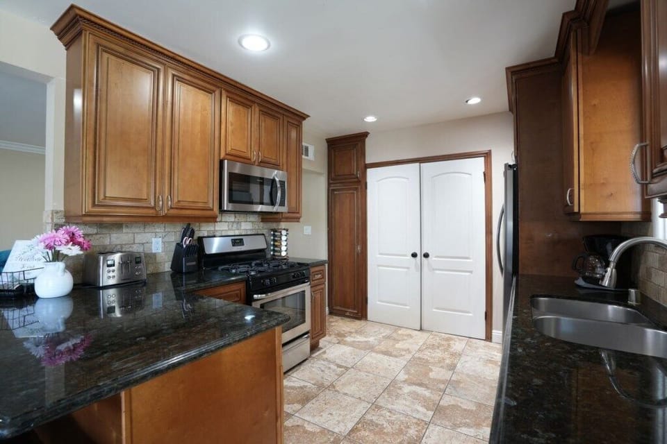 Custom Kitchen with Granite Countertops
Custom Kitchen with Granite Countertops and Stainless Steel Appliances