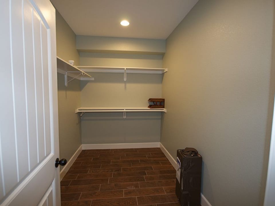 - Spacious walk-in closet with built-in shelving for organized storage   - Convenient design makes unpacking and settling in easy for families   - Extra space to keep luggage and belongings during your vacation stay