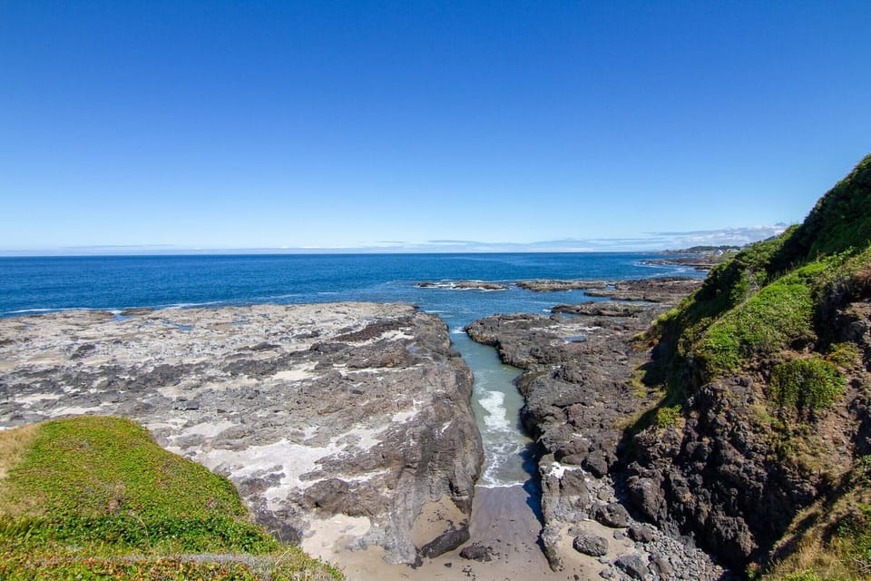 The house sits on a bluff where you can watch the tides ebb and flow through this canal.