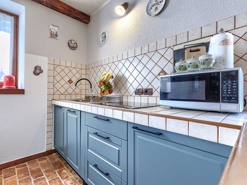 Kitchen, Countertop, Kitchen Appliance, Interior Design, Cabinetry, Major Appliance, Flooring, Kitchen Stove, Kitchen Sink, Home