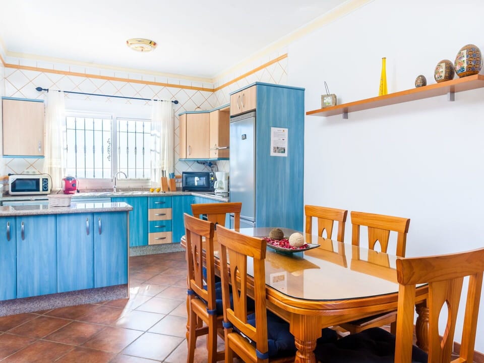 Room, Property, Furniture, Yellow, House, Building, Turquoise, Kitchen, Dining Room, Floor