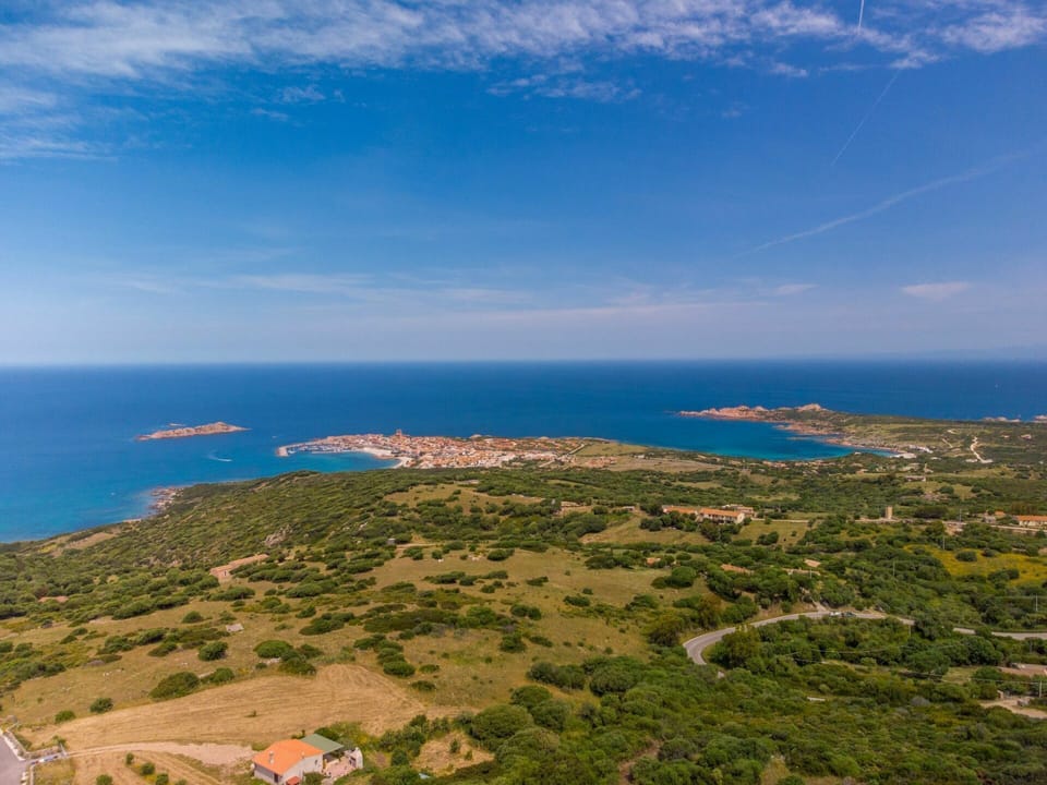 Cloud, Sky, Water, Ecoregion, Natural Landscape, Azure, Plant, Natural Environment, Coastal And Oceanic Landforms, Terrain
