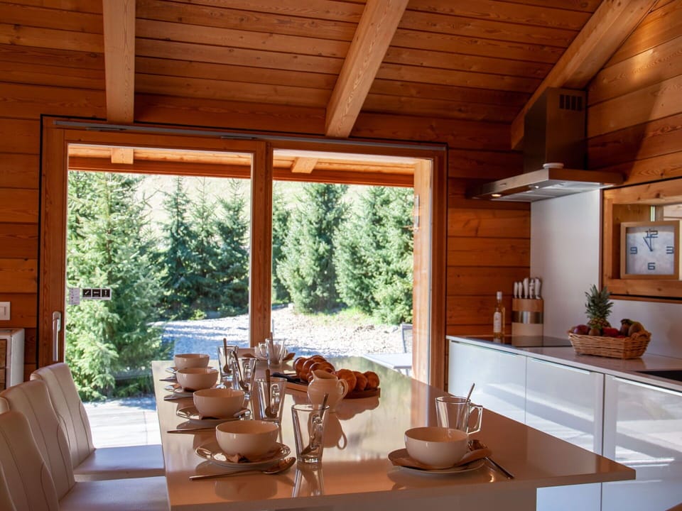 Property, Plant, Table, Wood, Interior Design, Tableware, Shade, Floor, Window, Building