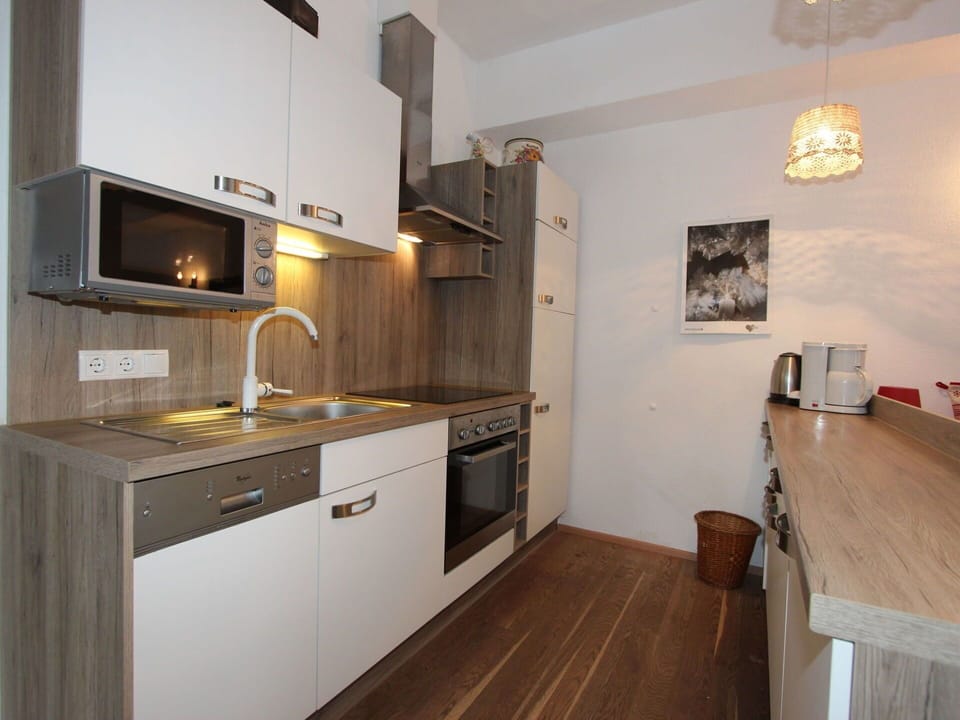 Countertop, Room, Property, Cabinetry, Furniture, Kitchen, Interior Design, Floor, Building, Hardwood