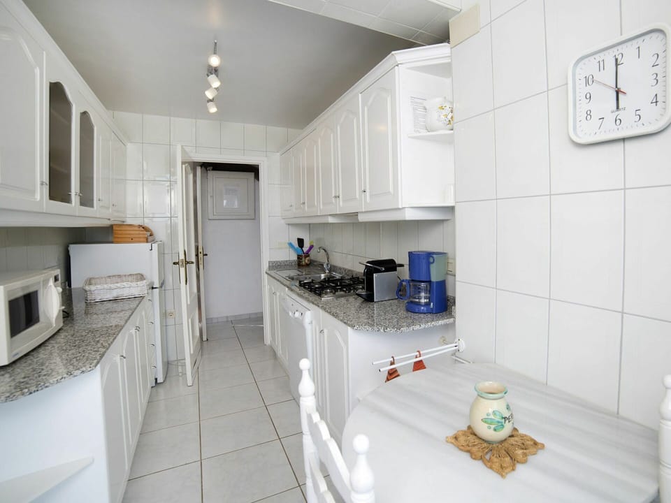 Cabinetry, Countertop, Kitchen, Sink, Interior Design, Building, Kitchen Stove, Kitchen Appliance, Floor