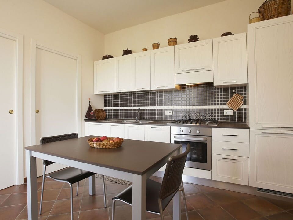 Furniture, Room, Property, Kitchen, Countertop, Cabinetry, Interior Design, Kitchen Stove, Building, Floor