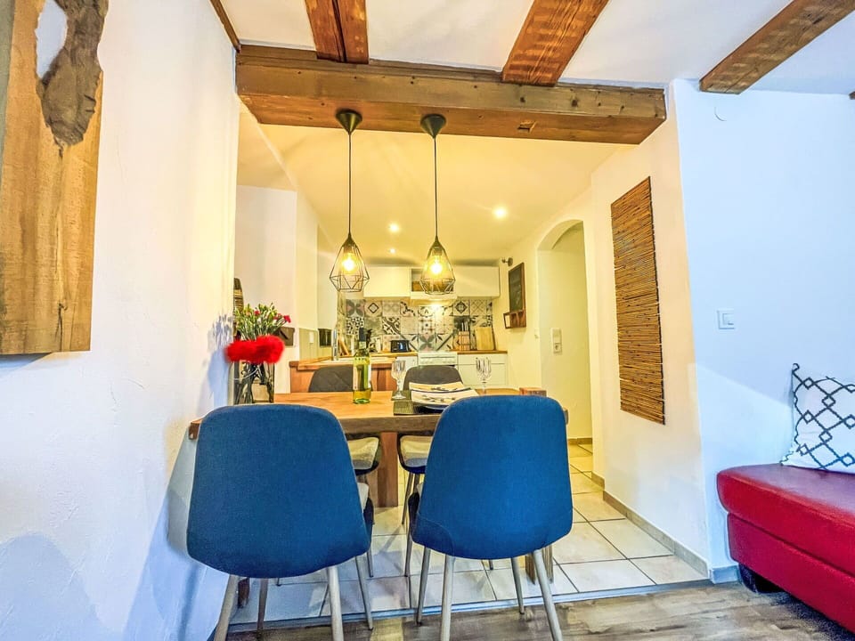 Interior Design, Furniture, Wall, Flooring, Wood, Ceiling, Floor, Room, Couch, Lighting