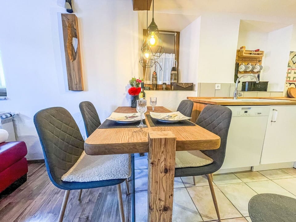 Furniture, Interior Design, Flooring, Wood, Floor, Room, Table, Lighting, Ceiling, Kitchen & Dining Room Table