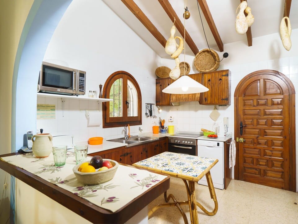 Room, Property, Interior Design, Furniture, Yellow, Building, Arch, Ceiling, Kitchen, Architecture
