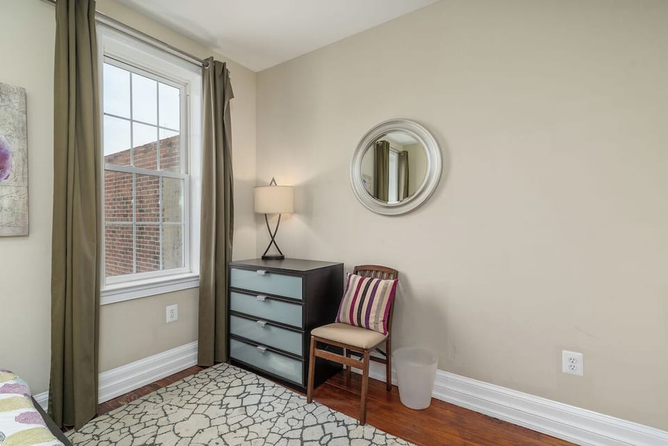 second floor, first bedroom, king bed with dresser and chair